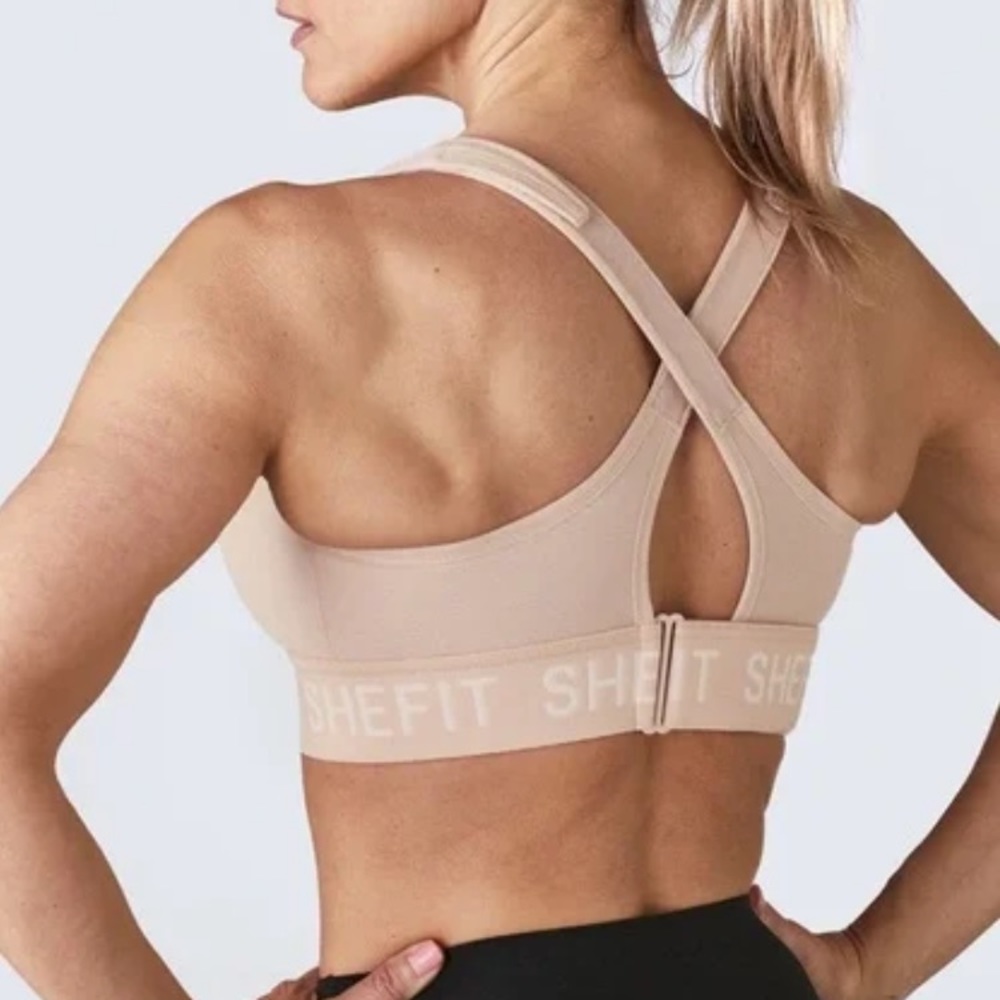 Shefit size medium WHITE high impact adjustable sports bra.